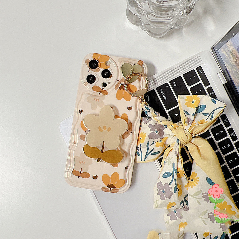 Floral iPhone case with autumn leaves and silk scarf accessory